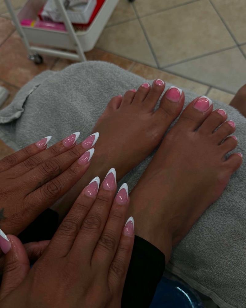 A French set with hand-painted detail across hands and toes